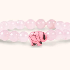 pink beaded bracelet with an elephant