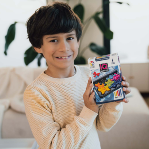 boy holding iq waves box