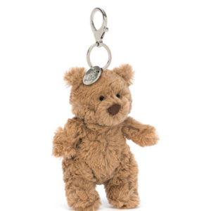 brown fuzzy bear on a key chain ring