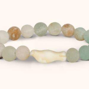 greenish blueish beaded bracelet with a seal on it