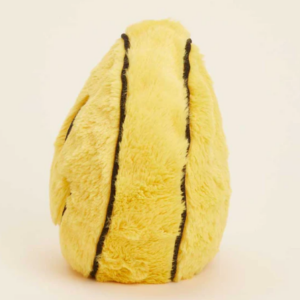 side view of a yellow plush smiley face