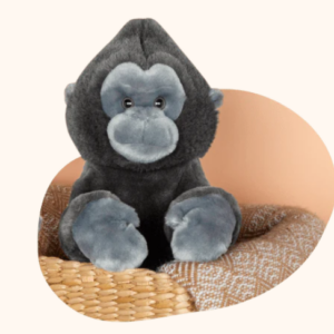 grey gorilla plush on a chair