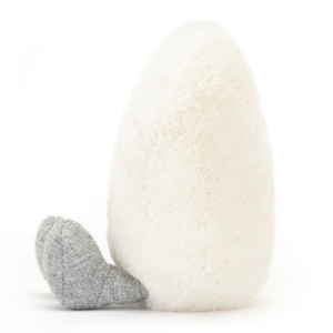 side view of cream heart plush with legs