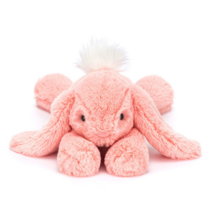 pink apricot bunny from jellycat laying down