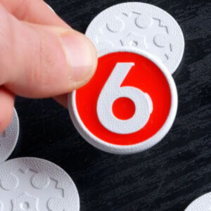 number 6 chip with red and white