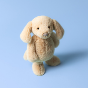 tan puppy dog plush standing