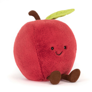 red plush apple with face and green leaf